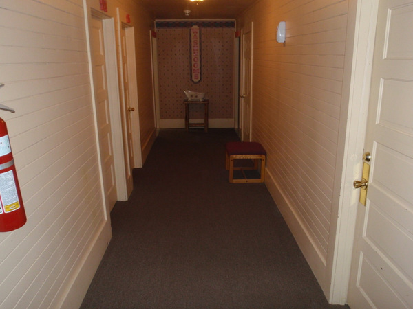 Motel Hallway and common toilet-bathroom facilities.
